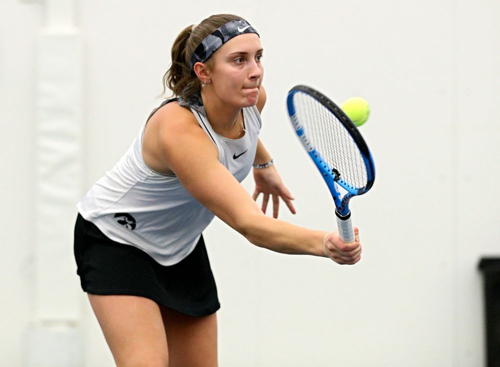 Iowa’s Ashleigh Jacobs returns a shot during her doubles match at the Hawkeye Tennis and Recreation Complex in Iowa City on Sunday, February 16, 2020. (Stephen Mally/hawkeyesports.com)