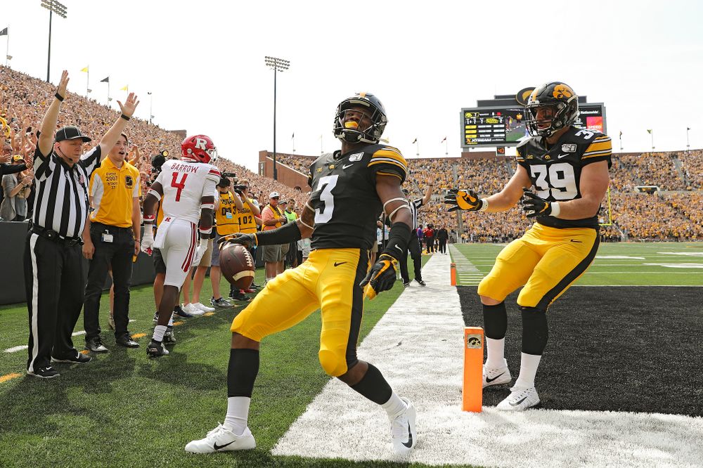 Iowa Hawkeyes wide receiver Tyrone Tracy Jr. (3) celebrates with tight end Nate Wieting (39) after his 7-yard touchdown reception during the second quarter of their Big Ten Conference football game at Kinnick Stadium in Iowa City on Saturday, Sep 7, 2019. (Stephen Mally/hawkeyesports.com)