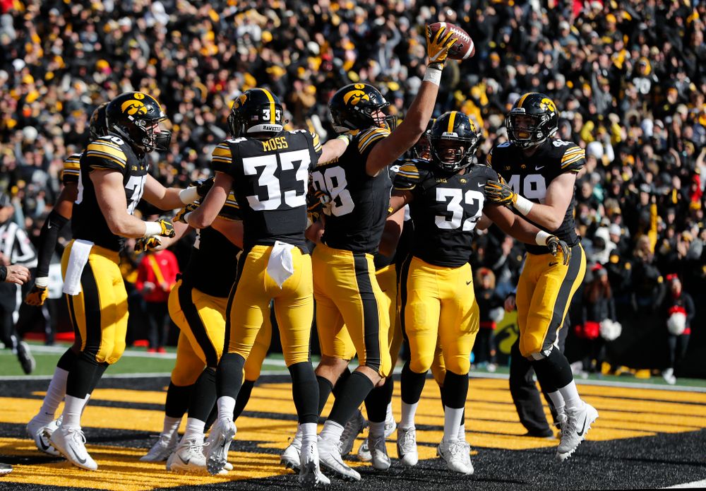 Iowa Hawkeyes defensive end Anthony Nelson (98) holds up the ball after recovering a fumble in the end zone against the Maryland Terrapins Saturday, October 20, 2018 at Kinnick Stadium (Brian Ray/hawkeyesports.com)