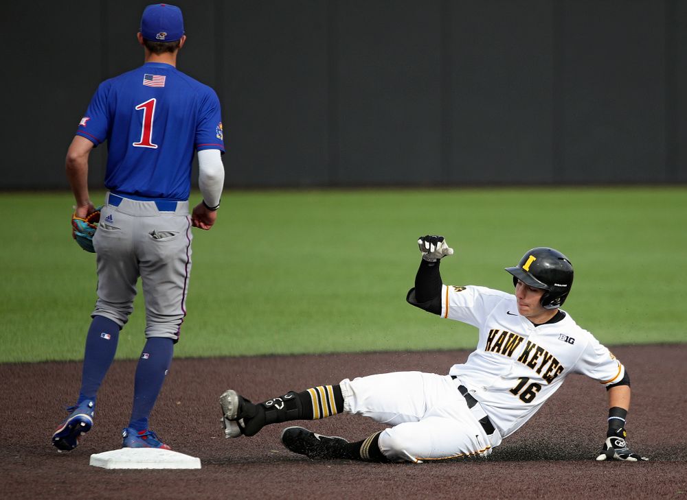 Iowa catcher Tyler Snep (16) slides into second base after hitting a double during the seventh inning of their college baseball game at Duane Banks Field in Iowa City on Wednesday, March 11, 2020. (Stephen Mally/hawkeyesports.com)