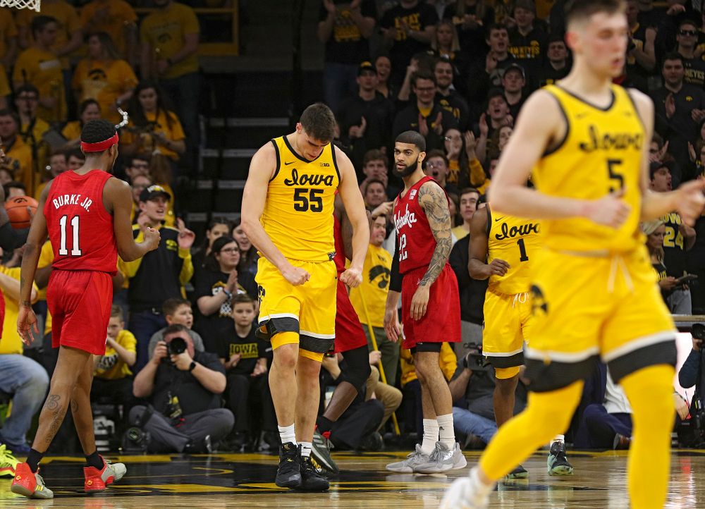 Iowa Hawkeyes center Luka Garza (55) flexes after making a basket while being fouled during the first half of their game at Carver-Hawkeye Arena in Iowa City on Saturday, February 8, 2020. (Stephen Mally/hawkeyesports.com)