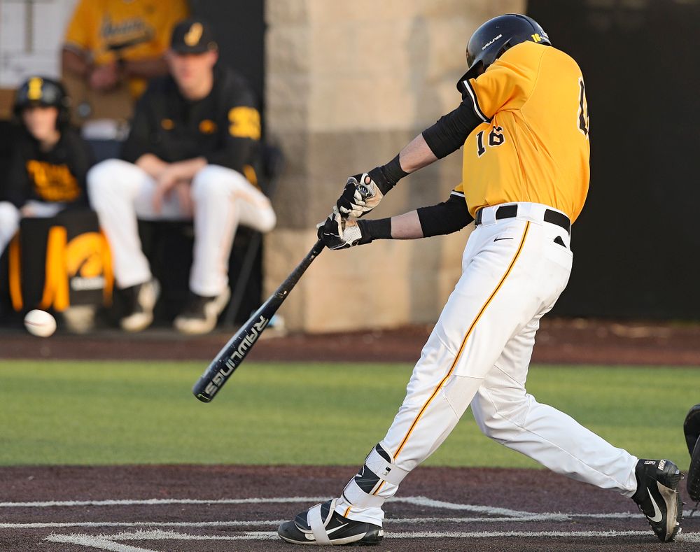 Iowa Hawkeyes shortstop Tanner Wetrich (16) hits an RBI triple during the seventh inning of their game against Northern Illinois at Duane Banks Field in Iowa City on Tuesday, Apr. 16, 2019. (Stephen Mally/hawkeyesports.com)