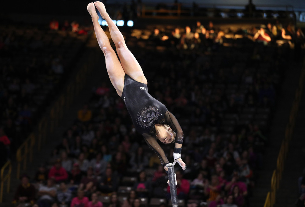 Iowa's Jax Krantz competes on the bars during their meet against the Minnesota Golden Gophers Saturday, January 19, 2019 at Carver-Hawkeye Arena. (Brian Ray/hawkeyesports.com)