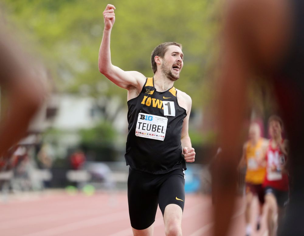 Iowa's Nolan Teubel pumps his fist as he crosses the finish line during the men’s 800 meter event on the second day of the Big Ten Outdoor Track and Field Championships at Francis X. Cretzmeyer Track in Iowa City on Saturday, May. 11, 2019. (Stephen Mally/hawkeyesports.com)