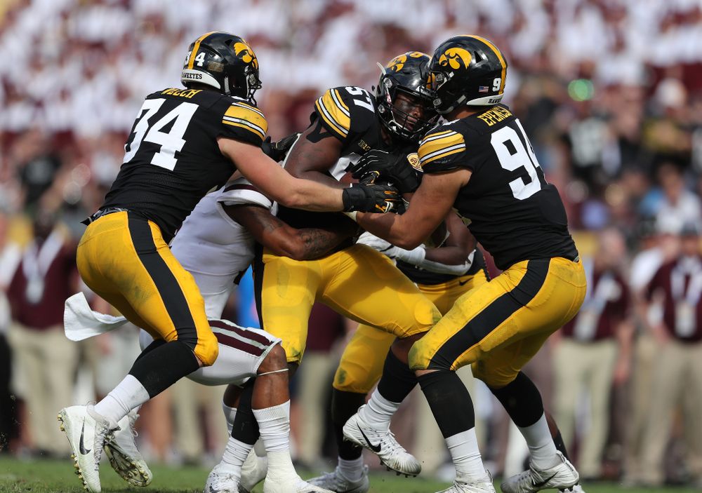 Iowa Hawkeyes defensive end Chauncey Golston (57) intercepts a pass during the Outback Bowl Tuesday, January 1, 2019 at Raymond James Stadium in Tampa, FL. (Brian Ray/hawkeyesports.com)
