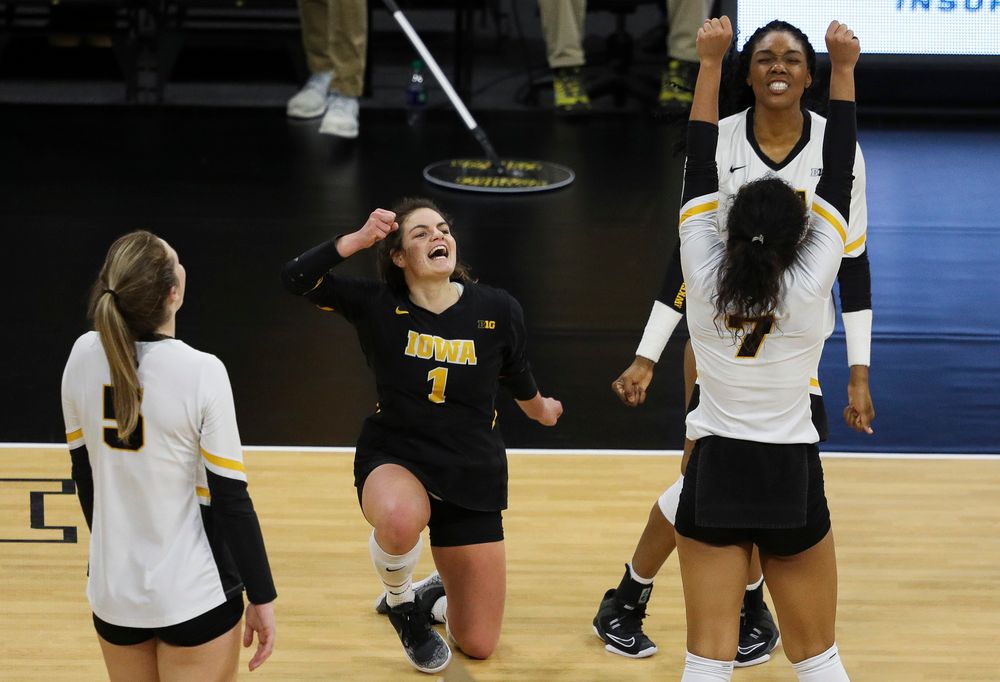 Iowa Hawkeyes defensive specialist Molly Kelly (1) celebrates after winning a point during a match against Maryland at Carver-Hawkeye Arena on November 23, 2018. (Tork Mason/hawkeyesports.com)