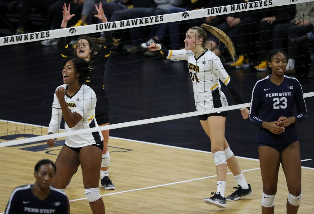 Iowa Hawkeyes defensive specialist Molly Kelly (1) and Iowa Hawkeyes outside hitter Cali Hoye (14) celebrate after winning a point during a match against Penn State at Carver-Hawkeye Arena on November 3, 2018. (Tork Mason/hawkeyesports.com)