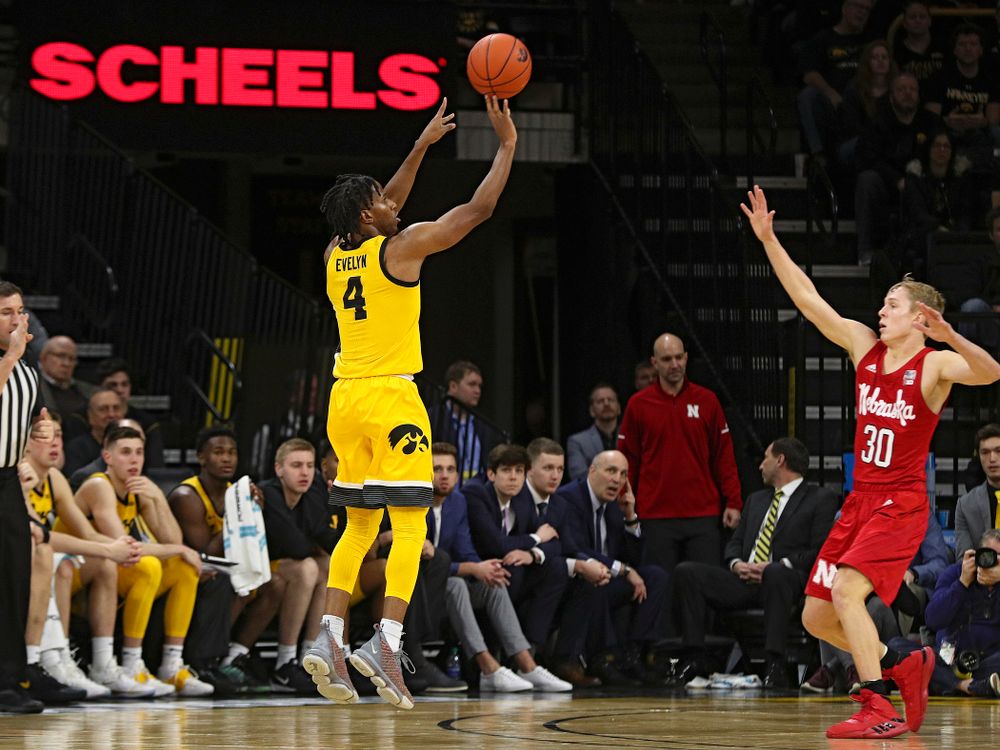 Iowa Hawkeyes guard Bakari Evelyn (4) makes a 3-pointer during the second half of their game at Carver-Hawkeye Arena in Iowa City on Saturday, February 8, 2020. (Stephen Mally/hawkeyesports.com)