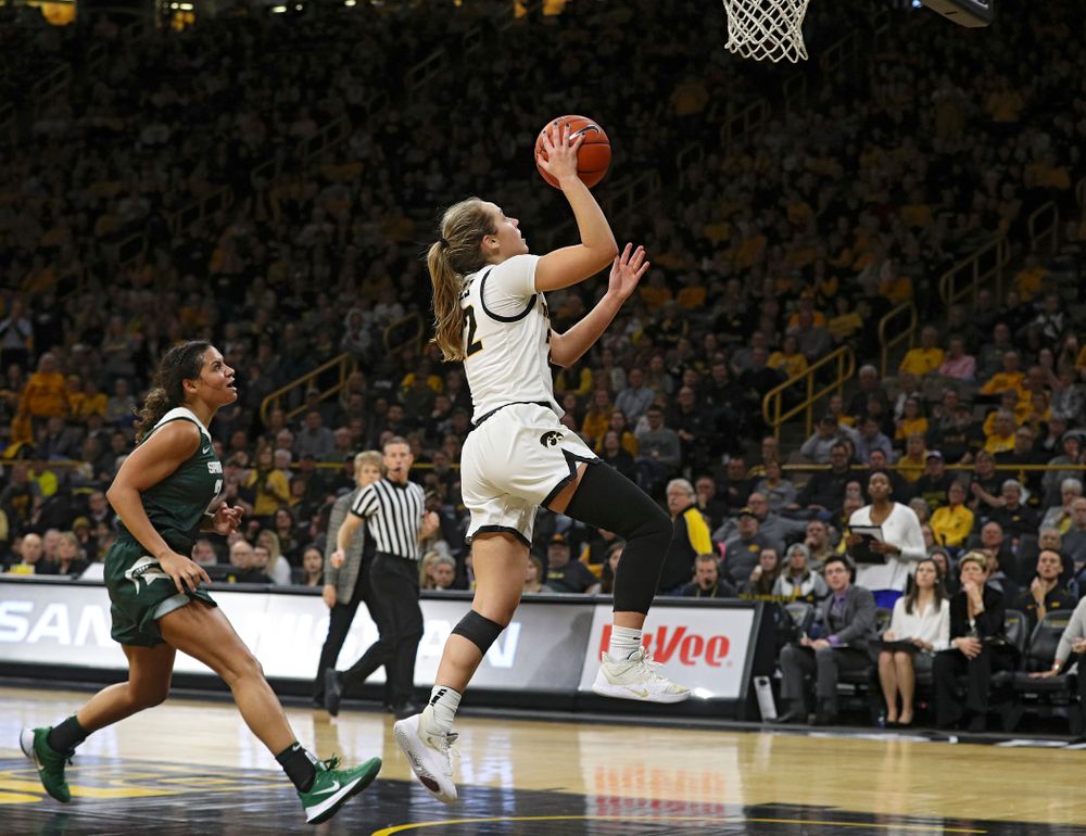 Iowa Hawkeyes guard Kathleen Doyle (22) makes a basket during the fourth quarter of their game at Carver-Hawkeye Arena in Iowa City on Sunday, January 26, 2020. (Stephen Mally/hawkeyesports.com)