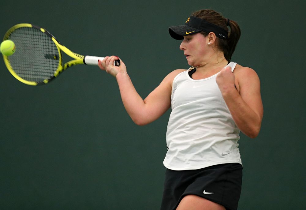 Iowa’s Danielle Bauers returns a shot during her singles match at the Hawkeye Tennis and Recreation Complex in Iowa City on Sunday, February 23, 2020. (Stephen Mally/hawkeyesports.com)