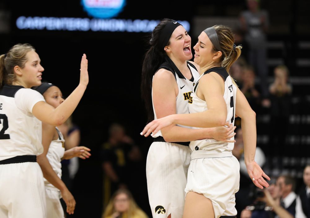 Iowa Hawkeyes forward Megan Gustafson (10) hugs i21#2 after she picked up an offensive rebound late against the Nebraska Cornhuskers Thursday, January 3, 2019 at Carver-Hawkeye Arena. (Brian Ray/hawkeyesports.com)