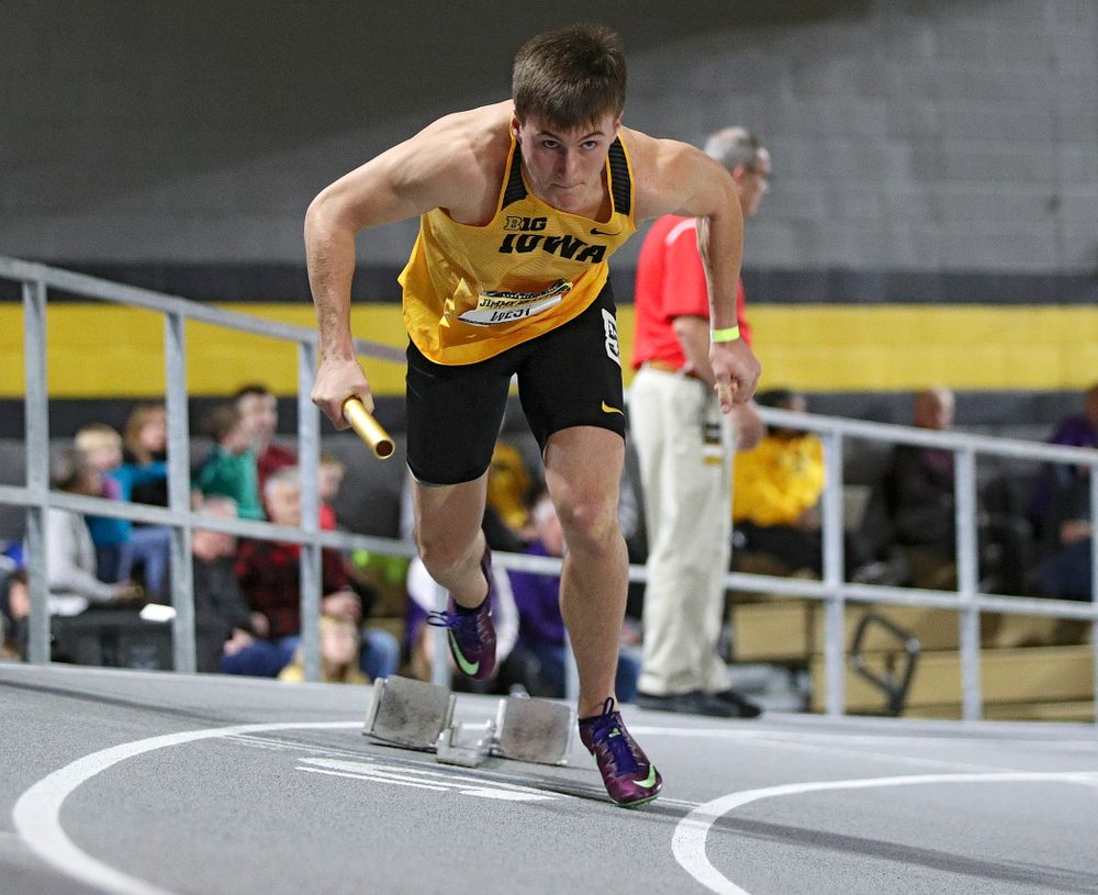 Iowa’s Austin West runs the men’s 1600 meter relay event during the Jimmy Grant Invitational at the Recreation Building in Iowa City on Saturday, December 14, 2019. (Stephen Mally/hawkeyesports.com)
