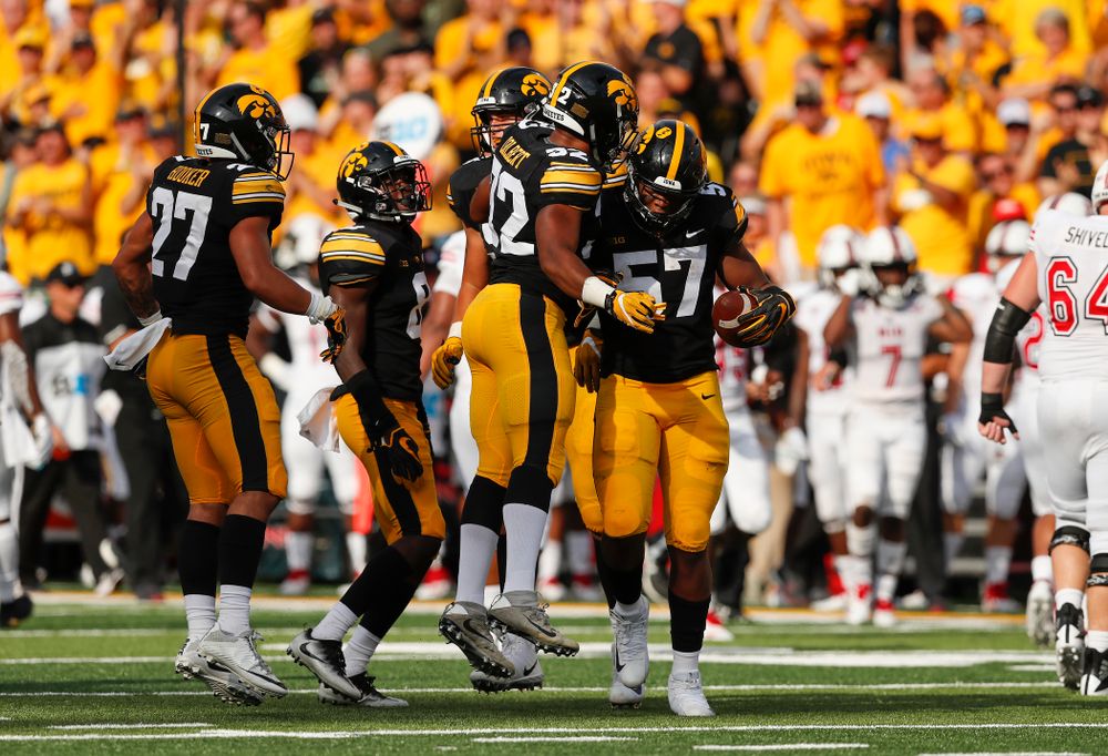 Iowa Hawkeyes defensive end Chauncey Golston (57) celebrates after recovering a fumble against the Northern Illinois Huskies Saturday, September 1, 2018 at Kinnick Stadium. (Brian Ray/hawkeyesports.com)