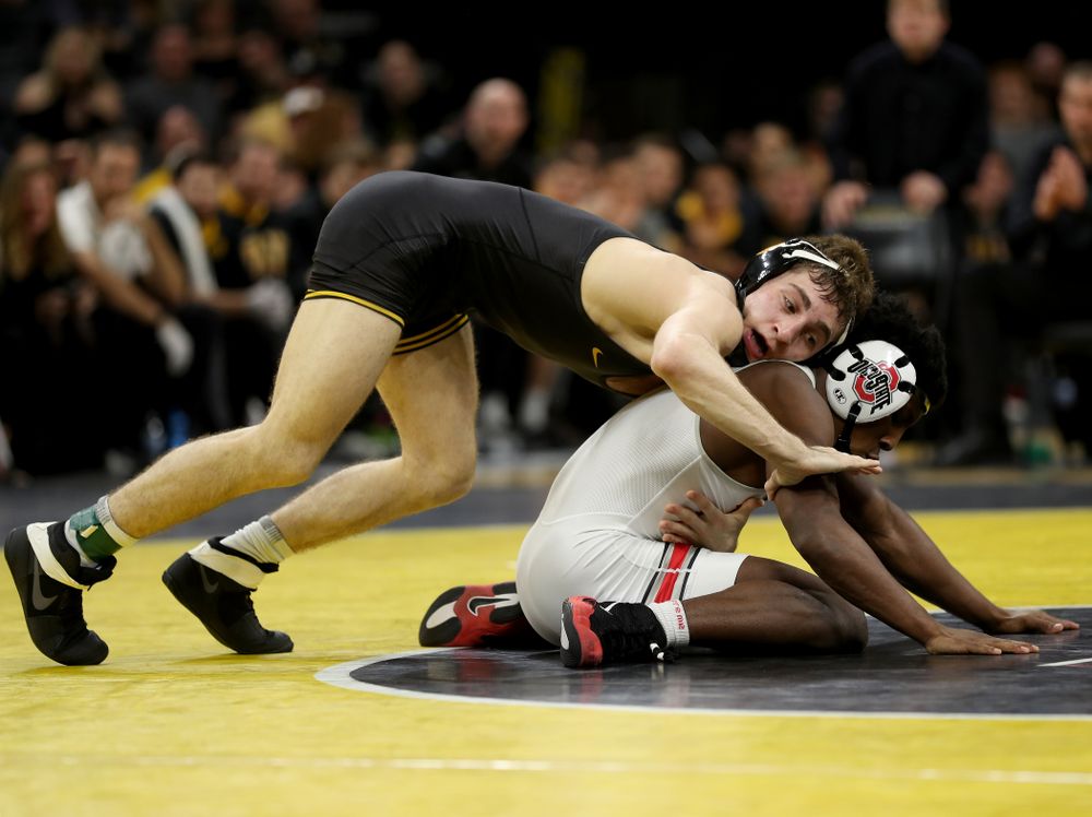 Iowa’s Austin DeSanto wrestles Ohio State’s Jordan Decatur at 133 pounds Friday, January 24, 2020 at Carver-Hawkeye Arena. DeSanto won the match with a 21-3 tech fall. (Brian Ray/hawkeyesports.com)