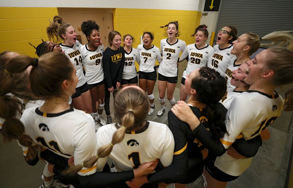 The Iowa Hawkeyes huddle before the start of their volleyball match at Carver-Hawkeye Arena in Iowa City on Sunday, Oct 13, 2019. (Stephen Mally/hawkeyesports.com)