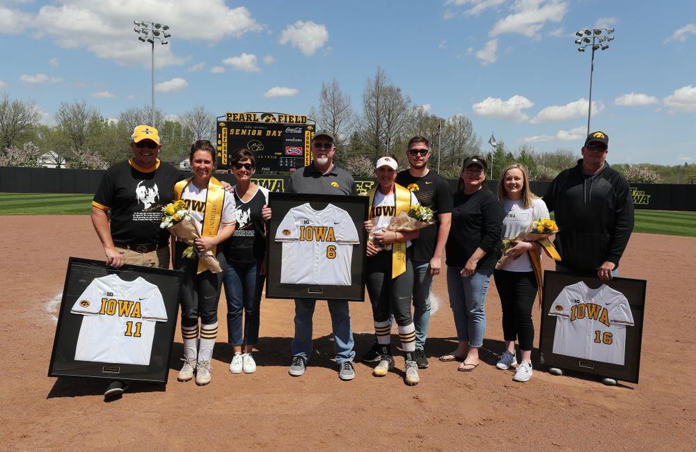 Iowa Hawkeyes seniors Mallory Kilian (11), Erin Riding (6) and Brooke Rozier pose for a photo during senior day festivities following their game against the Ohio State Buckeyes on senior day Sunday, May 5, 2019 at Pearl Field. (Brian Ray/hawkeyesports.com)
