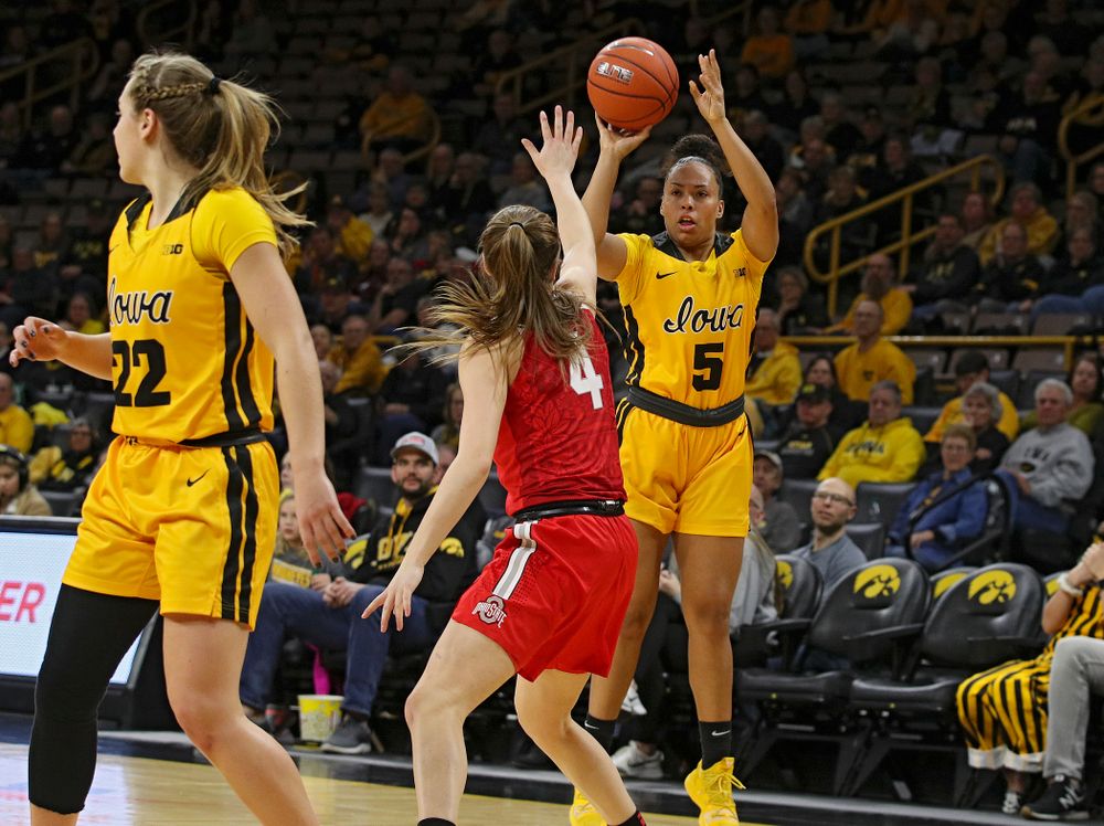 Iowa Hawkeyes guard Alexis Sevillian (5) makes a 3-pointer during the first quarter of their game at Carver-Hawkeye Arena in Iowa City on Thursday, January 23, 2020. (Stephen Mally/hawkeyesports.com)