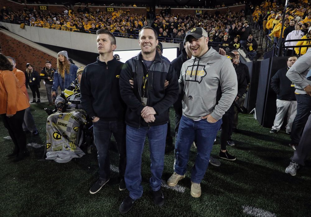 Former Hawkeyes Joe Conklin, Brett Greenwood, and Pat Angerer are recognized with the rest of the 2009 team during the Iowa Hawkeyes game against the Penn State Nittany Lions Saturday, October 12, 2019 at Kinnick Stadium. (Brian Ray/hawkeyesports.com)