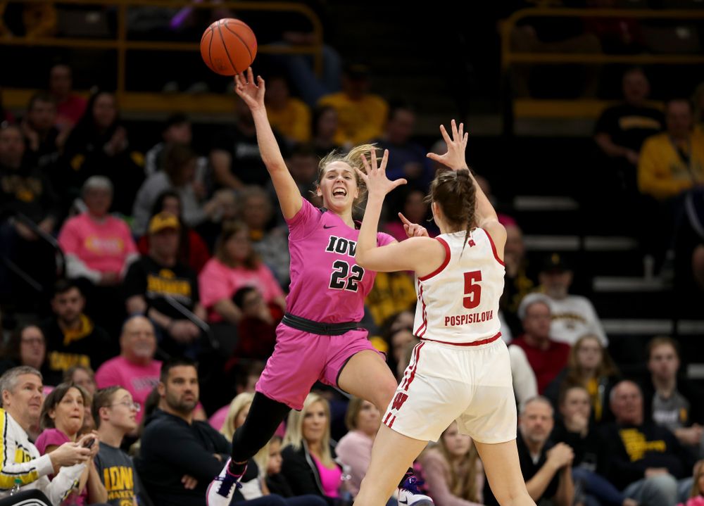 Iowa Hawkeyes guard Kathleen Doyle (22) saves a ball from going out of bounds against the Wisconsin Badgers Sunday, February 16, 2020 at Carver-Hawkeye Arena. (Brian Ray/hawkeyesports.com)