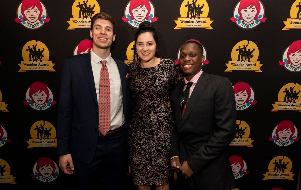 Iowa Hawkeyes forward Megan Gustafson (10) on the red carpet WisconsinÕs Ethan Happ and Michigan StateÕs Cassius Winston before the ESPN College Basketball Awards show Friday, April 12, 2019 at The Novo at LA Live.  (Brian Ray/hawkeyesports.com)