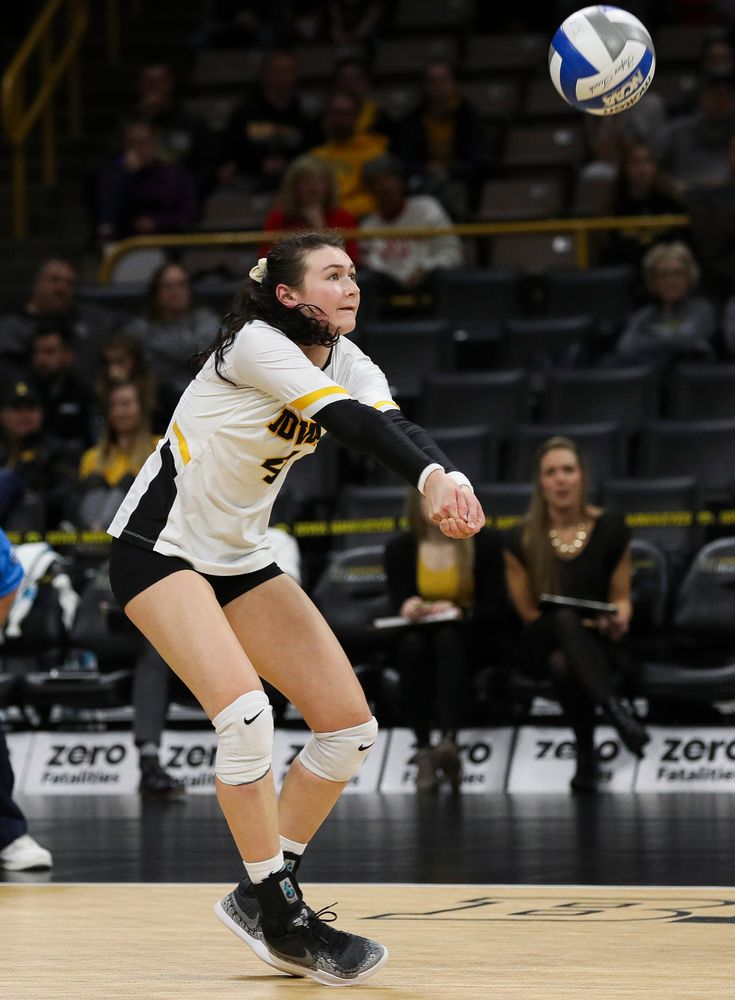 Iowa Hawkeyes defensive specialist Halle Johnston (4) bumps the ball during a match against Maryland at Carver-Hawkeye Arena on November 23, 2018. (Tork Mason/hawkeyesports.com)