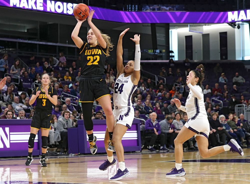 Iowa Hawkeyes guard Kathleen Doyle (22) shoots during the third quarter of their game at Welsh-Ryan Arena in Evanston, Ill. on Sunday, January 5, 2020. (Stephen Mally/hawkeyesports.com)