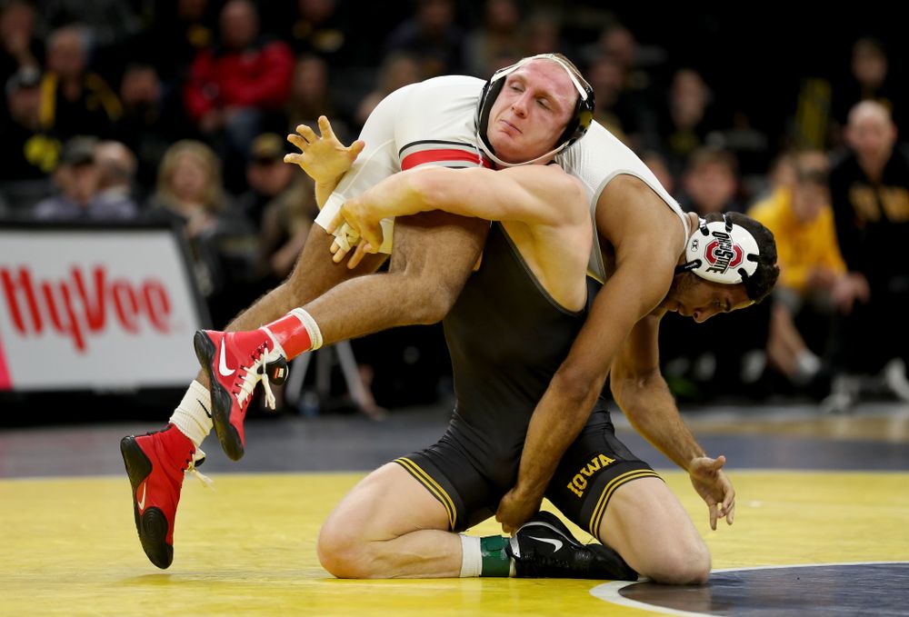 Iowa’s Kaleb Young wrestles Ohio State’s Elijah Cleary at 157 pounds Friday, January 24, 2020 at Carver-Hawkeye Arena. Young won the match with a 4-1. (Brian Ray/hawkeyesports.com)
