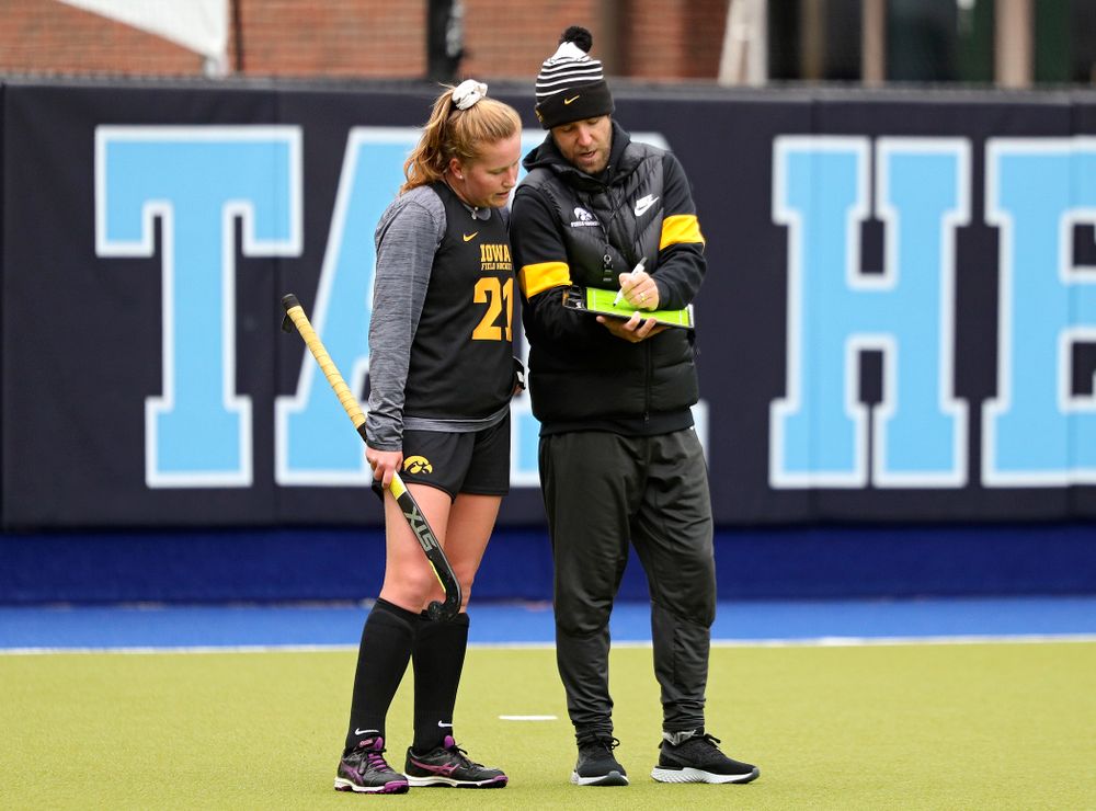 Iowa’s Makenna Maguire (21) talks with assistant coach Michael Boal during their practice at Karen Shelton Stadium in Chapel Hill, N.C. on Thursday, Nov 14, 2019. (Stephen Mally/hawkeyesports.com)