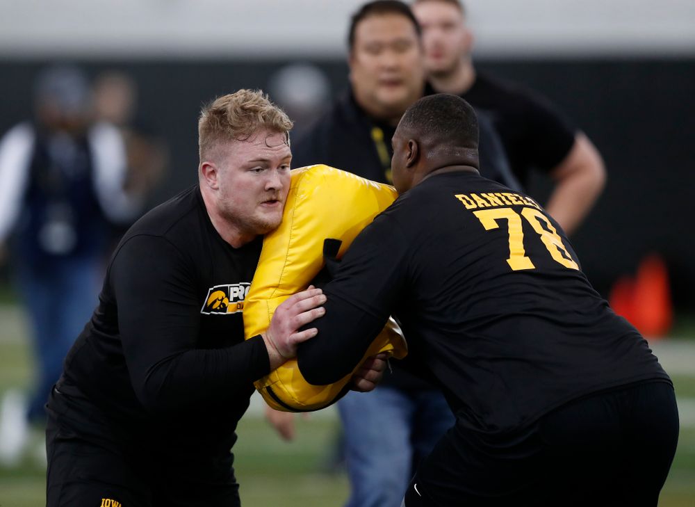 Iowa Hawkeyes offensive lineman Sean Welsh (79) and offensive lineman James Daniels (78) during the team's annual pro day Monday, March 26, 2018 at the Hansen Football Performance Center. (Brian Ray/hawkeyesports.com)