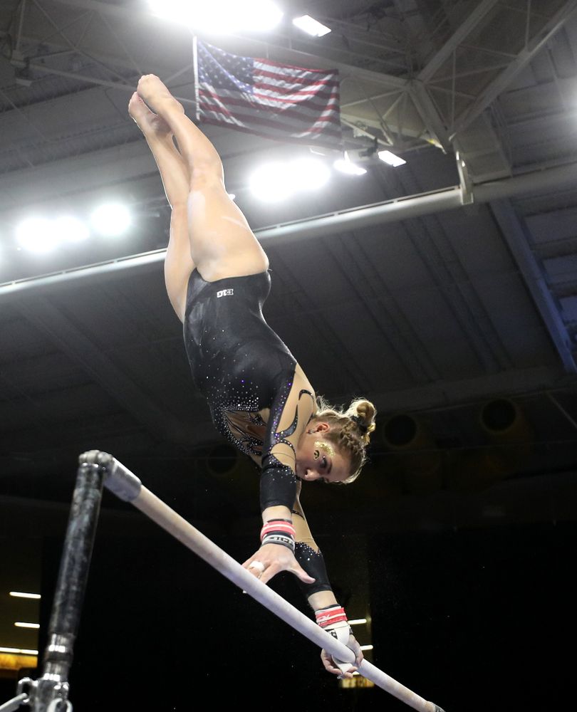 Iowa's Emma Hartzler competes on the bars during their meet against Southeast Missouri State Friday, January 11, 2019 at Carver-Hawkeye Arena. (Brian Ray/hawkeyesports.com)