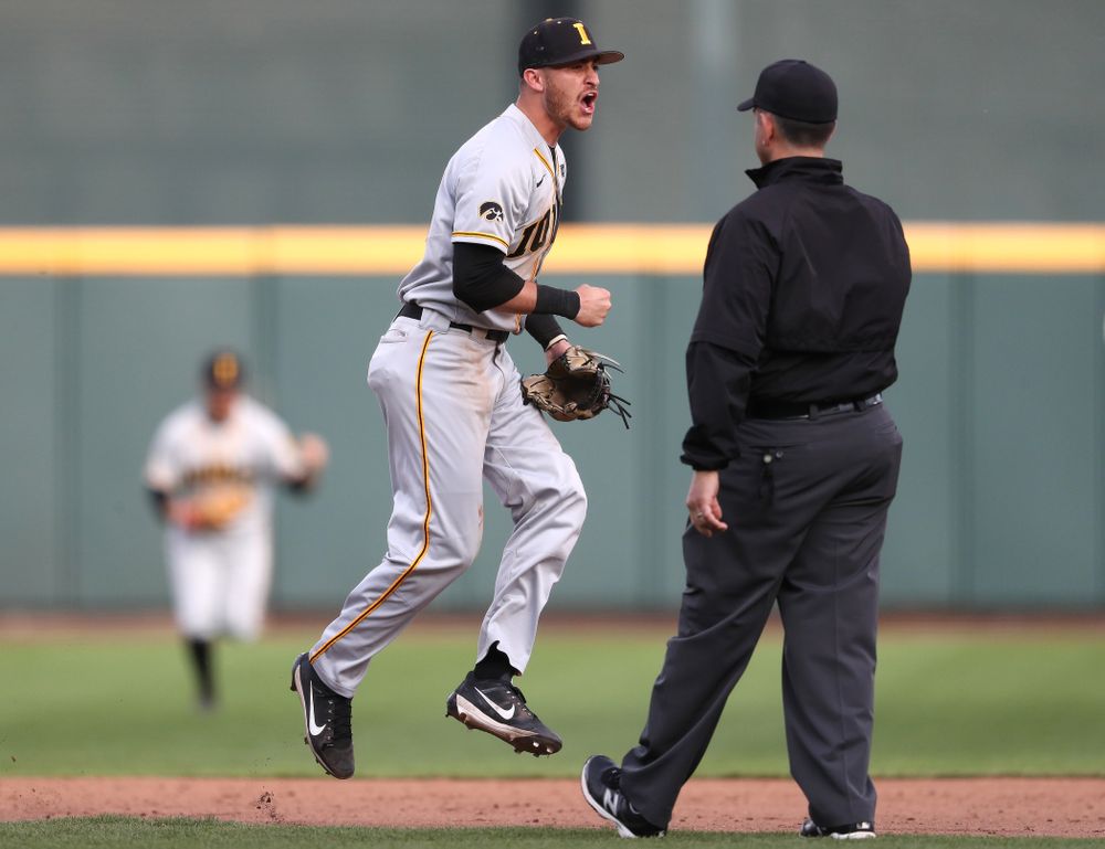 Iowa Hawkeyes Tanner Wetrich (16) celebrates after tuning a double play against the Indiana Hoosiers in the first round of the Big Ten Baseball Tournament Wednesday, May 22, 2019 at TD Ameritrade Park in Omaha, Neb. (Brian Ray/hawkeyesports.com)