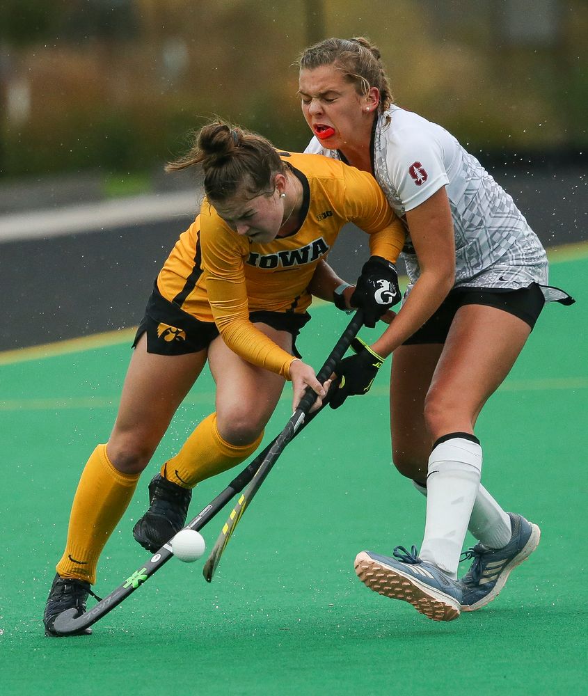 Iowa Hawkeyes midfielder Meghan Conroy (5) dribbles through contact during a game against Stanford at Grant Field on October 7, 2018. (Tork Mason/hawkeyesports.com)
