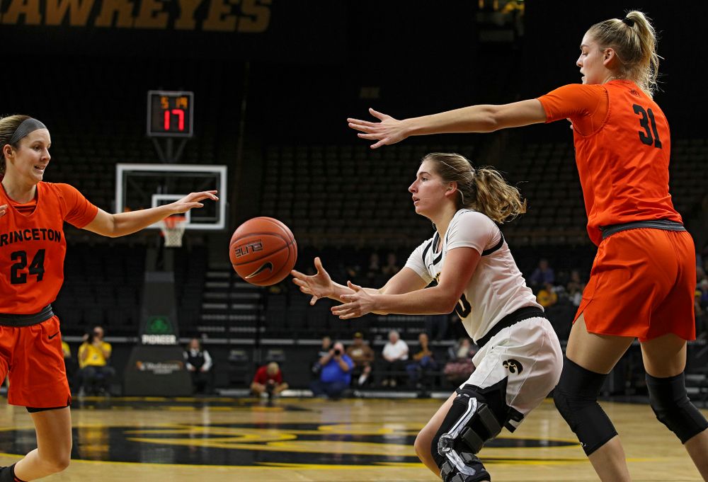 Iowa guard Kate Martin (20) passes the ball during the second quarter of their overtime win against Princeton at Carver-Hawkeye Arena in Iowa City on Wednesday, Nov 20, 2019. (Stephen Mally/hawkeyesports.com)