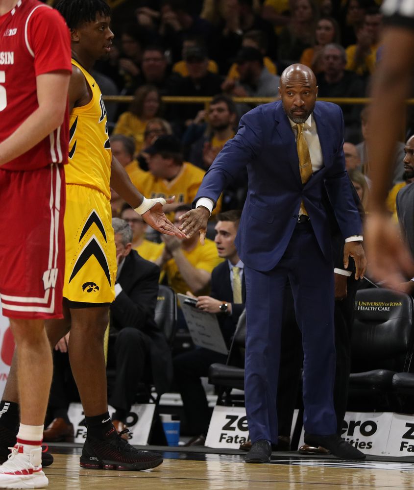 Iowa Hawkeyes assistant coach Andrew Francis against the Wisconsin Badgers Friday, November 30, 2018 at Carver-Hawkeye Arena. (Brian Ray/hawkeyesports.com)