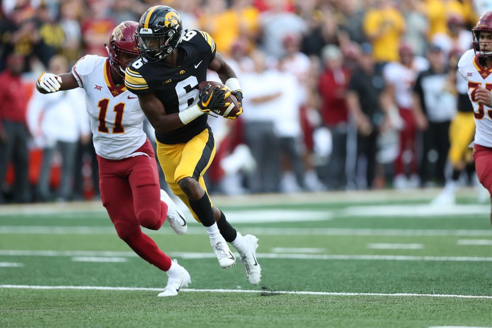 Iowa Hawkeyes wide receiver Ihmir Smith-Marsette (6) picks up a first down against the Iowa State Cyclones Saturday, September 8, 2018 at Kinnick Stadium. (Max Allen/hawkeyesports.com)