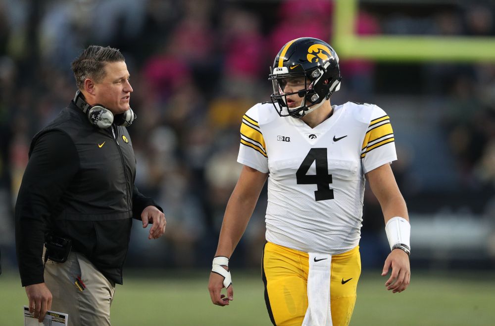 Iowa Hawkeyes offensive coordinator Brian Ferentz and quarterback Nate Stanley (4) against the Purdue Boilermakers Saturday, November 3, 2018 Ross Ade Stadium in West Lafayette, Ind. (Brian Ray/hawkeyesports.com)