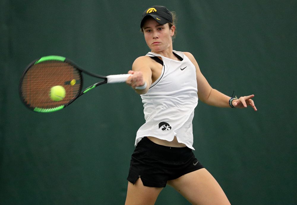 Iowa’s Elise Van Heuvelen returns a shot during her singles match at the Hawkeye Tennis and Recreation Complex in Iowa City on Sunday, February 16, 2020. (Stephen Mally/hawkeyesports.com)