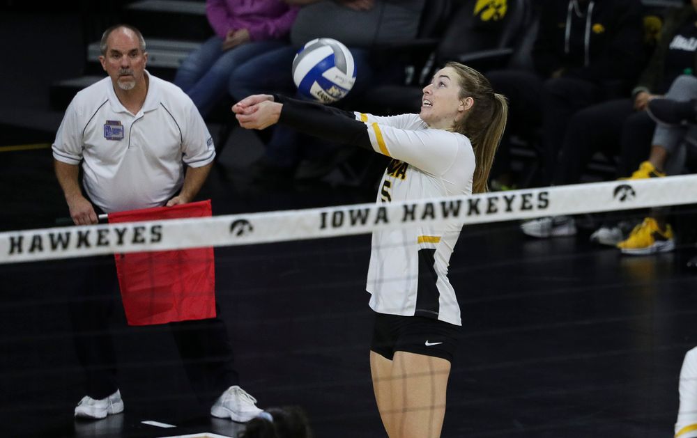 Iowa Hawkeyes outside hitter Meghan Buzzerio (5) bumps the ball during a match against Penn State at Carver-Hawkeye Arena on November 3, 2018. (Tork Mason/hawkeyesports.com)