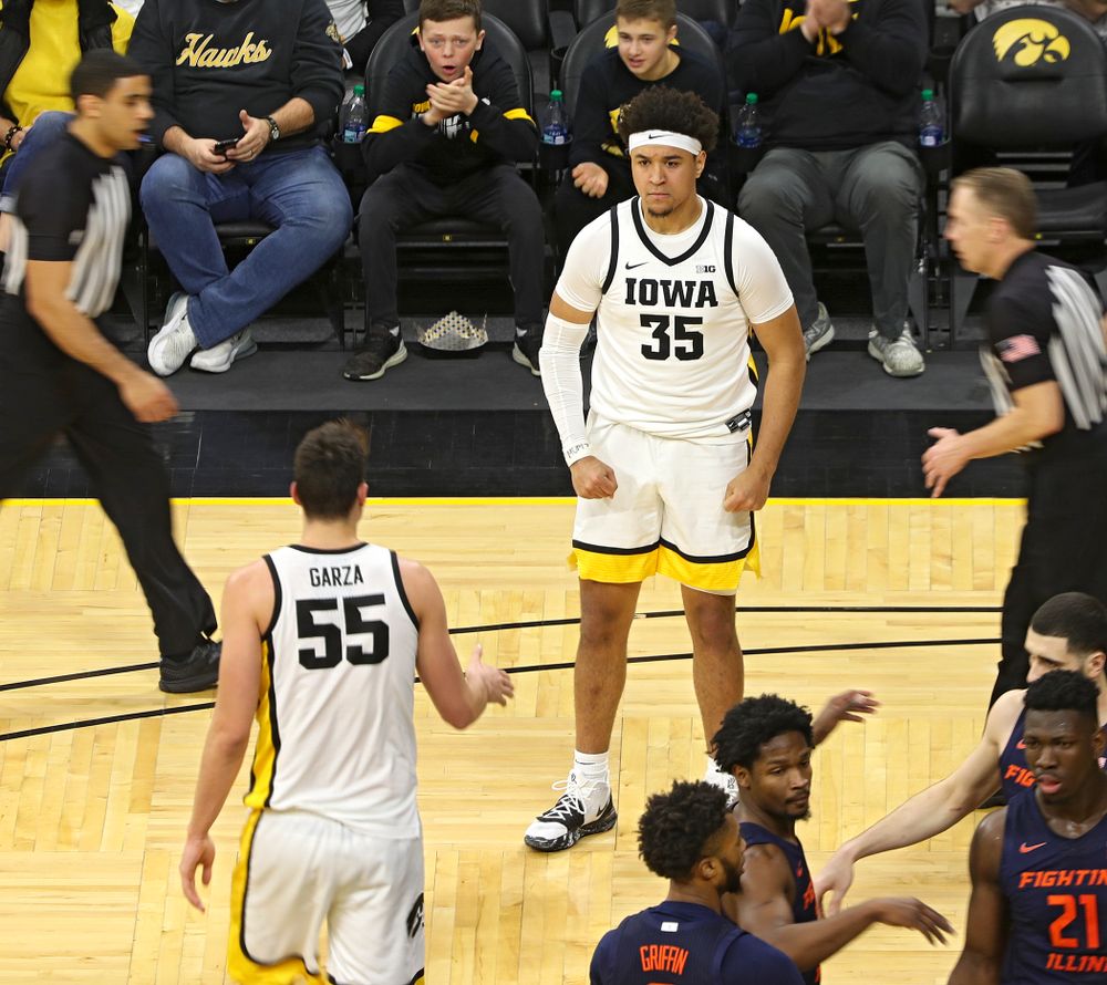 Iowa Hawkeyes forward Cordell Pemsl (35) celebrates after center Luka Garza (55) made a basket while being fouled during the first quarter of the game at Carver-Hawkeye Arena in Iowa City on Sunday, February 2, 2020. (Stephen Mally/hawkeyesports.com)