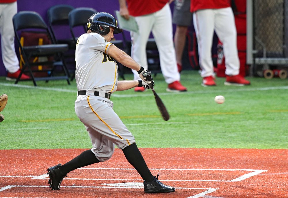 Iowa Hawkeyes outfielder Justin Jenkins (6) hits an RBI double during the seventh inning of their CambriaCollegeClassic game at U.S. Bank Stadium in Minneapolis, Minn. on Friday, February 28, 2020. (Stephen Mally/hawkeyesports.com)