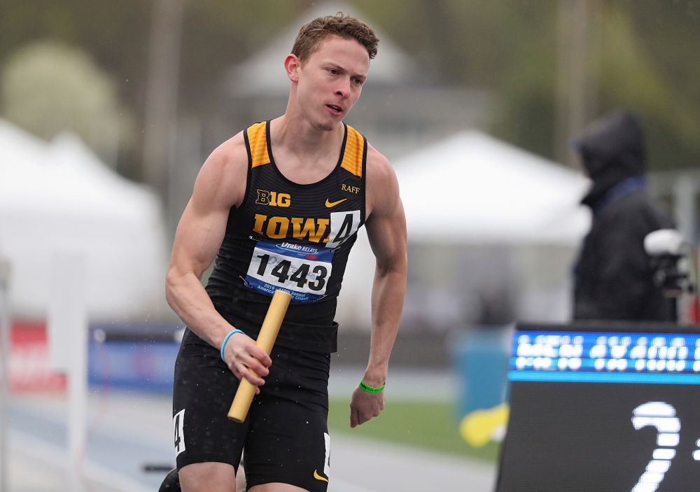 Iowa's Chris Thompson runs the men's 1600 meter relay event during the third day of the Drake Relays at Drake Stadium in Des Moines on Saturday, Apr. 27, 2019. (Stephen Mally/hawkeyesports.com)