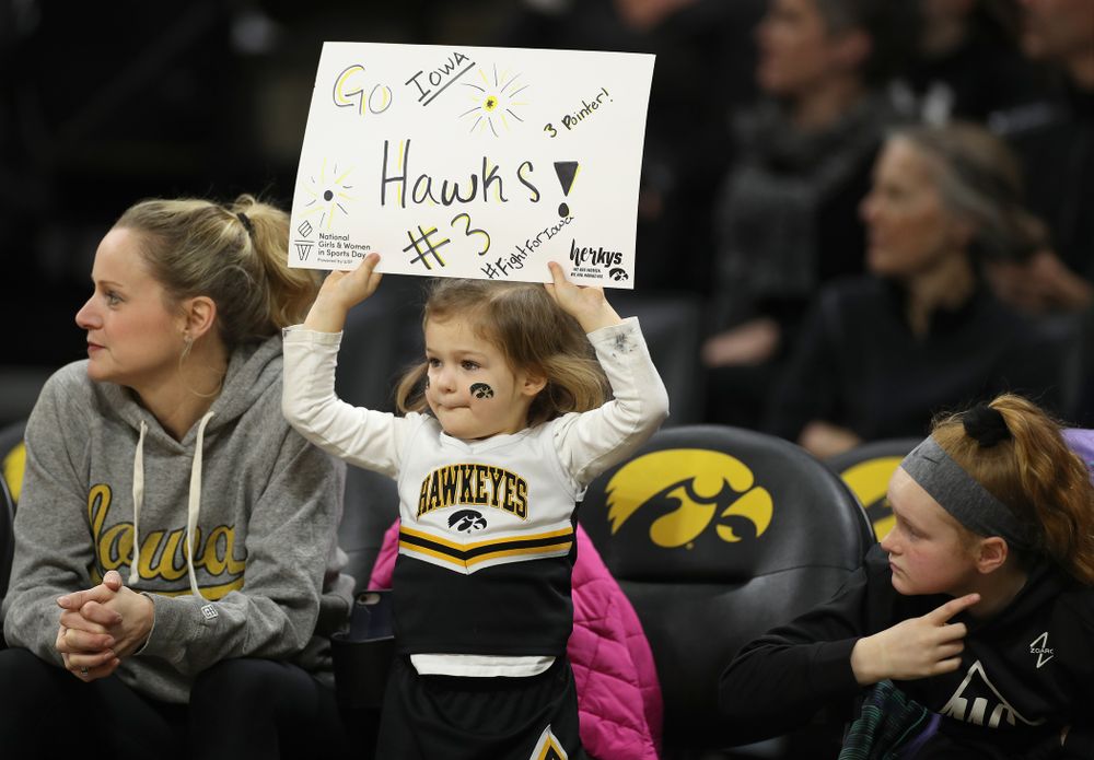 A young fan cheers on the Iowa Hawkeyes against Penn State Saturday, February 22, 2020 at Carver-Hawkeye Arena. (Brian Ray/hawkeyesports.com)