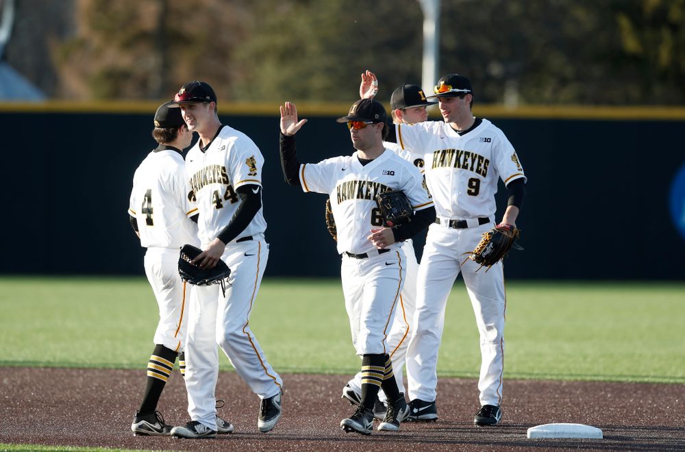 Iowa Hawkeyes outfielder Robert Neustrom (44), outfielder Justin Jenkins (6), and outfielder Ben Norman (9) against Northern Illinois Tuesday, April 17, 2018 at Duane Banks Field. (Brian Ray/hawkeyesports.com)