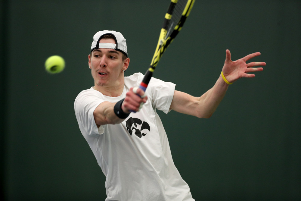 Iowa’s Nikita Snezhko against Cornell Sunday, March 8, 2020 at the Hawkeye Tennis and Recreation Center. (Brian Ray/hawkeyesports.com)