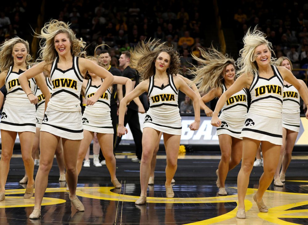 The Iowa Cheerleaders and Dance Team perform on senior night at half-time of the Iowa Hawkeyes game against the Purdue Boilermakers Tuesday, March 3, 2020 at Carver-Hawkeye Arena. (Brian Ray/hawkeyesports.com)