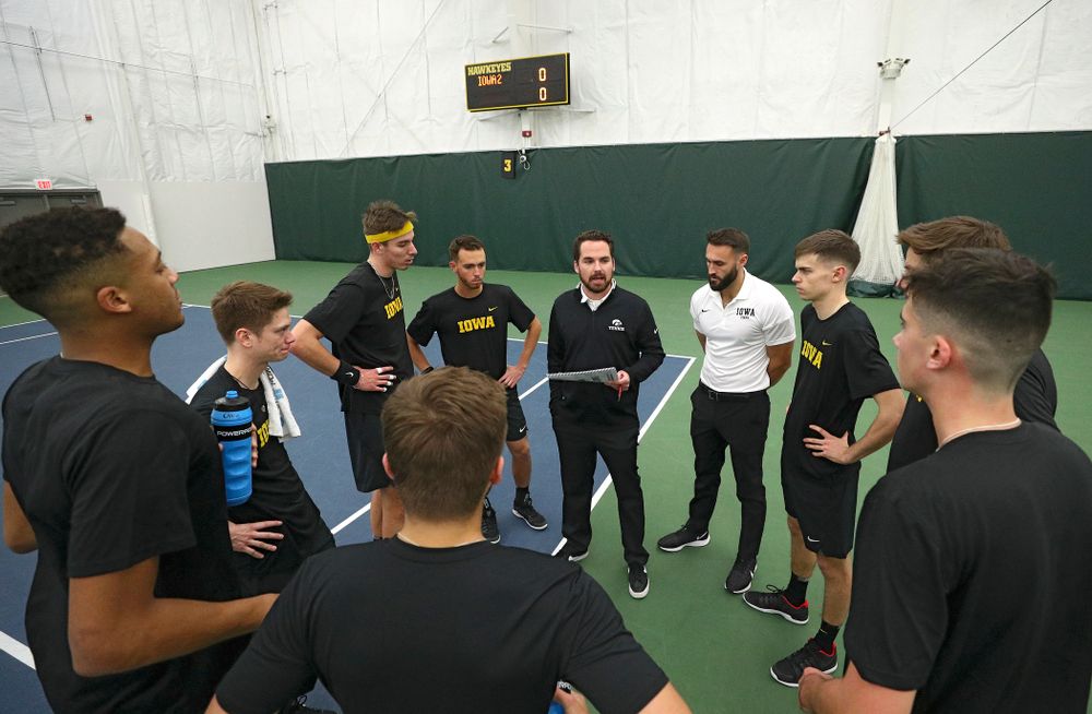 Iowa head coach Ross Wilson talks with his team before their match at the Hawkeye Tennis and Recreation Complex in Iowa City on Thursday, January 16, 2020. (Stephen Mally/hawkeyesports.com)