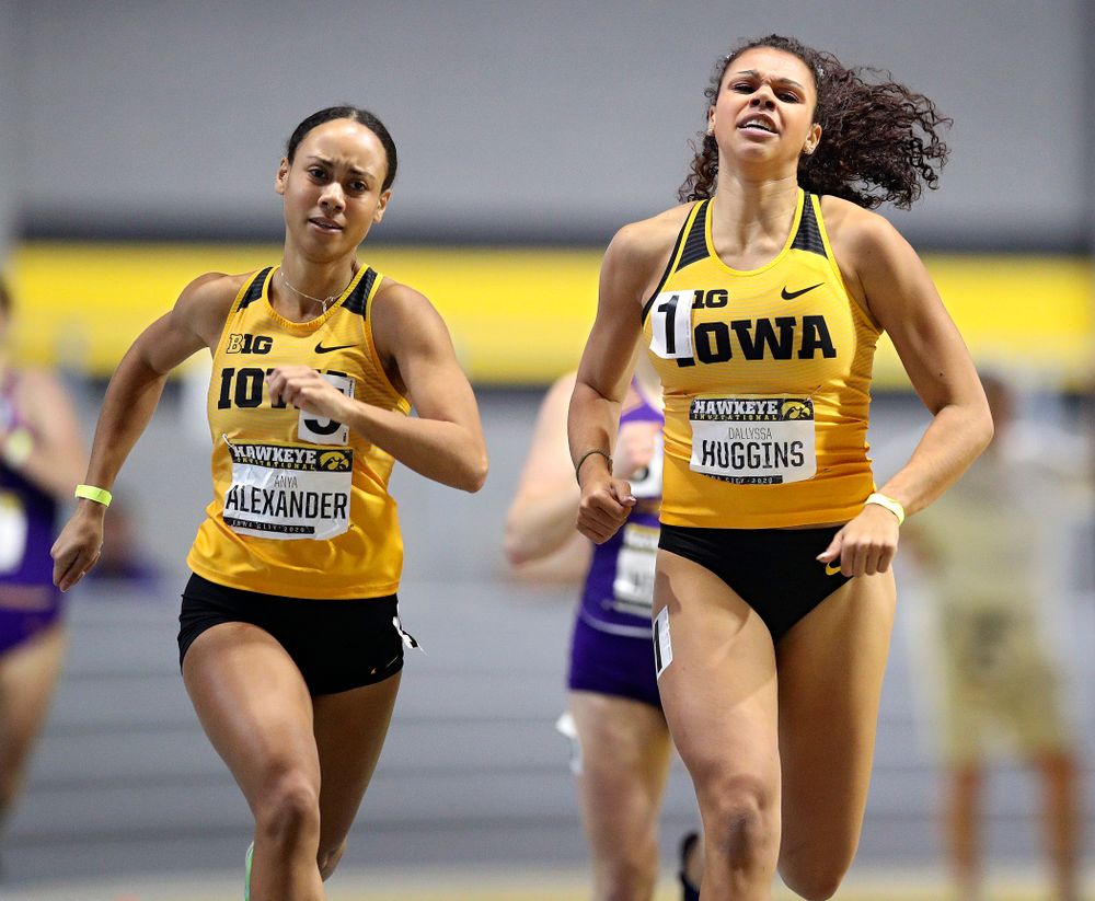 Iowa’s Anaya Alexander (from left) and Dallyssa Huggins run the women’s 600 meter run event during the Hawkeye Invitational at the Recreation Building in Iowa City on Saturday, January 11, 2020. (Stephen Mally/hawkeyesports.com)