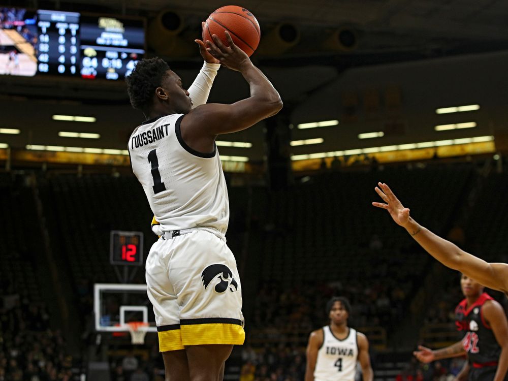 Iowa Hawkeyes guard Joe Toussaint (1) make a 3-pointer during the second half of their game at Carver-Hawkeye Arena in Iowa City on Friday, Nov 8, 2019. (Stephen Mally/hawkeyesports.com)