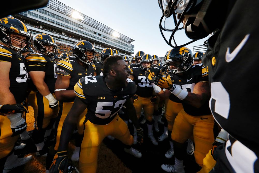 Iowa Hawkeyes linebacker Amani Jones (52) pumps up his teammates before their game against the Wisconsin Badgers Saturday, September 22, 2018 at Kinnick Stadium. (Brian Ray/hawkeyesports.com)