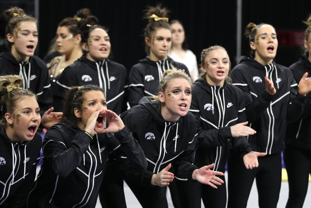 The Iowa Hawkeyes cheer on their teammates as they compete on the bars during their meet against Southeast Missouri State Friday, January 11, 2019 at Carver-Hawkeye Arena. (Brian Ray/hawkeyesports.com)